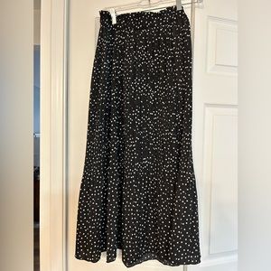 Pleated black and white midi skirt size Medium. Never worn.
